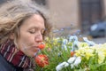 Woman appreciating fresh spring flowers