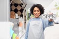 woman in apron with open sign over food truck Royalty Free Stock Photo