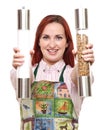 Woman in apron with salt and pepper Royalty Free Stock Photo