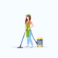Woman in apron using vacuum cleaner female janitor cleaning service floor care concept flat full length white background Royalty Free Stock Photo