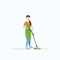 Woman in apron using vacuum cleaner female janitor cleaning service floor care concept flat full length white background Royalty Free Stock Photo