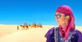 Woman in arabic traditional clothing. Sahara desert. Tunisia, North Africa Royalty Free Stock Photo