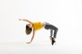 Woman Arching Back While Break Dancing Over White Background