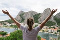 Woman with arms wide open. Royalty Free Stock Photo