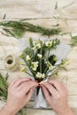 Woman arranging a bunch of mistletoe