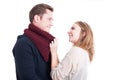 Woman arranging man's autumn casual neckcloth