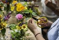 Woman arranging some flowers for decorate Royalty Free Stock Photo