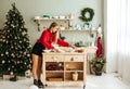 Woman arranging table for Christmas Royalty Free Stock Photo