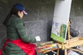 Woman artist painting in suzdal,russian federation