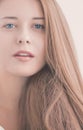 Woman as closeup beauty face portrait, young model with natural makeup look and long hairstyle for female hair care Royalty Free Stock Photo