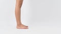 Woman asian legs and bearfoot is standing on white background.copy space Royalty Free Stock Photo
