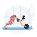 Woman athlete doing ab wheel rollout exercise on mat, girl training body strength Royalty Free Stock Photo