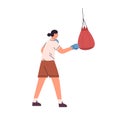 Woman athlete punching boxing bag. Female boxer training, hitting and beating punchball with fist in gloves. Strength