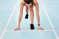 Woman, athlete and start on track field for running, training and fitness in summer. Professional runner, race and