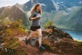 Woman athlete trail running outdoor in mountains active travel healthy lifestyle adventure training Royalty Free Stock Photo