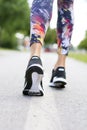 Woman with an athletic pair of shoes going for a jog or run Royalty Free Stock Photo