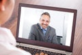 Woman attending video conference Royalty Free Stock Photo