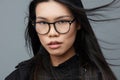 Woman attractive studio cute smile beauty beautiful portrait face glasses background student asian business fashion Royalty Free Stock Photo