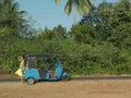 Woman By Autorickshaw On Dirt Road