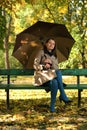 Woman in autumn park Royalty Free Stock Photo