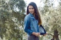 Woman autumn portrait. fashion girl outdoor. Autumn woman having fun at the park and smiling. Royalty Free Stock Photo