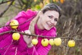 Woman with autumnal apple tree