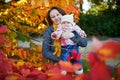 Woman and baby girl outdoors in park Royalty Free Stock Photo