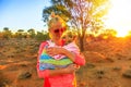 Woman with baby kangaroo