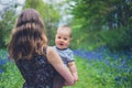 Woman with baby in meadow Royalty Free Stock Photo