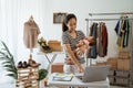 Woman with baby working from home of her online ecommerce shop Royalty Free Stock Photo