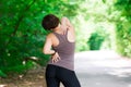 Woman with back pain, injury while running, trauma during workout Royalty Free Stock Photo