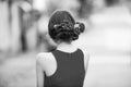 Woman back view with red roses in stylish hair Royalty Free Stock Photo