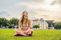 Woman on the background of Old Town Hall in George Town in Penang, Malaysia. The foundation stone was laid in 1879. Traveling wit