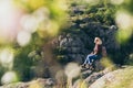 Woman with backpack hiking in the mountains