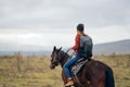 woman with backpack riding horse nature walk friendship Royalty Free Stock Photo