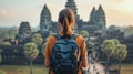 A woman with a backpack standing in front of an ancient temple, AI Royalty Free Stock Photo
