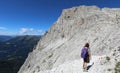 woman with backpack during a summer hiking in the Italian Dolomi Royalty Free Stock Photo