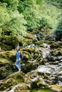 Woman with backpack travel mountain river Royalty Free Stock Photo
