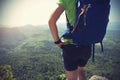 Woman backpacker enjoy the view on mountain peak Royalty Free Stock Photo