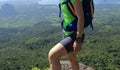 Woman backpacker enjoy the view on mountain peak Royalty Free Stock Photo