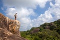 Woman backpacker hiking in the mountain peak Royalty Free Stock Photo