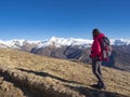 Woman backpacker in the italian alps