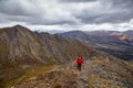 Woman Backpacking on Scenic Rocky Hiking Trail Royalty Free Stock Photo