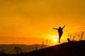 Woman backpacking to watch the sunset.Silhouette Royalty Free Stock Photo