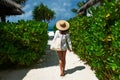 Woman with bag and sun hat going to beach Royalty Free Stock Photo