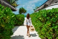 Woman with bag and sun hat going to beach Royalty Free Stock Photo