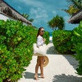 Woman with bag and sun hat going to beach Royalty Free Stock Photo