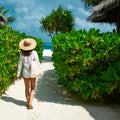 Woman with bag and sun hat going to beach Royalty Free Stock Photo