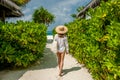 Woman with bag and sun hat going to beach Royalty Free Stock Photo