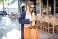 Woman with baguette in the city Royalty Free Stock Photo